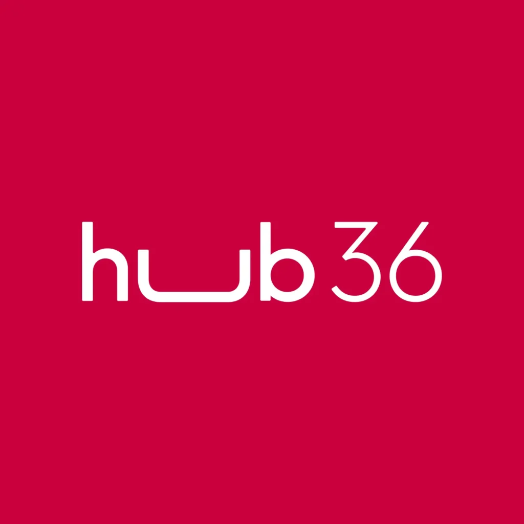 logo hub36 blanco coworking en albacete sobre fondo magenta